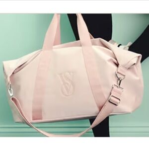 VICTORIA’S SECRET WATERPROOF METALLIC DUFFLE BAG